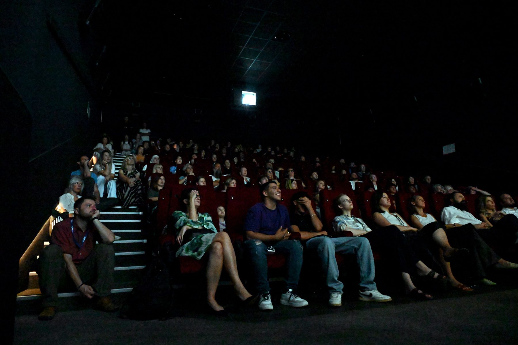 A full cinema watching a premiere